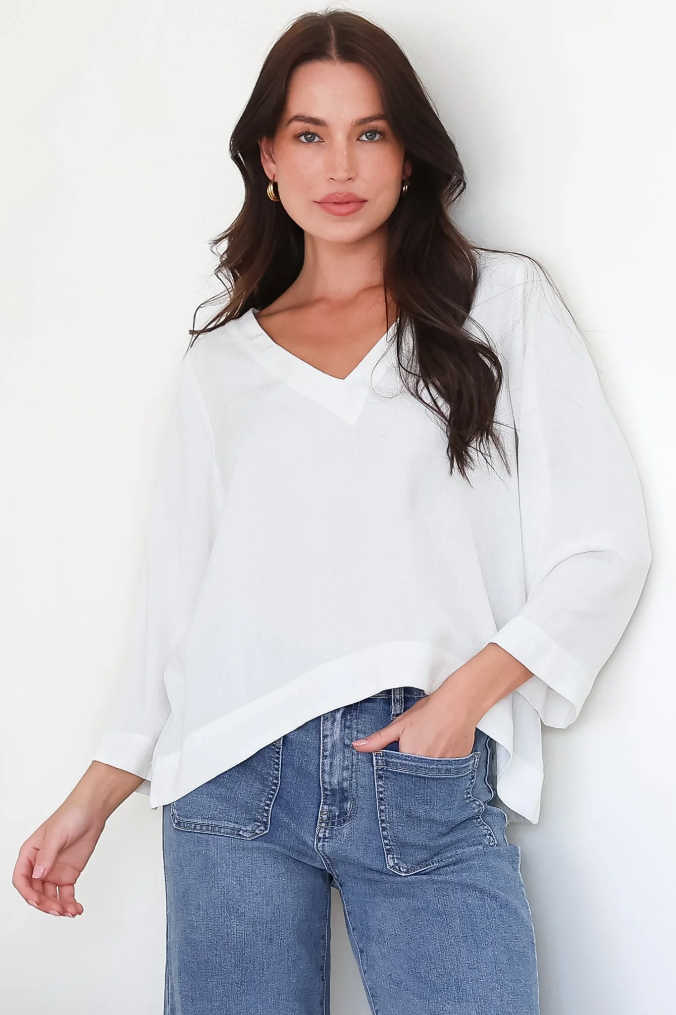 Breezer Top - Long Sleeve V Neck Pull Over Top with High Low Hemline in White - Image 2
