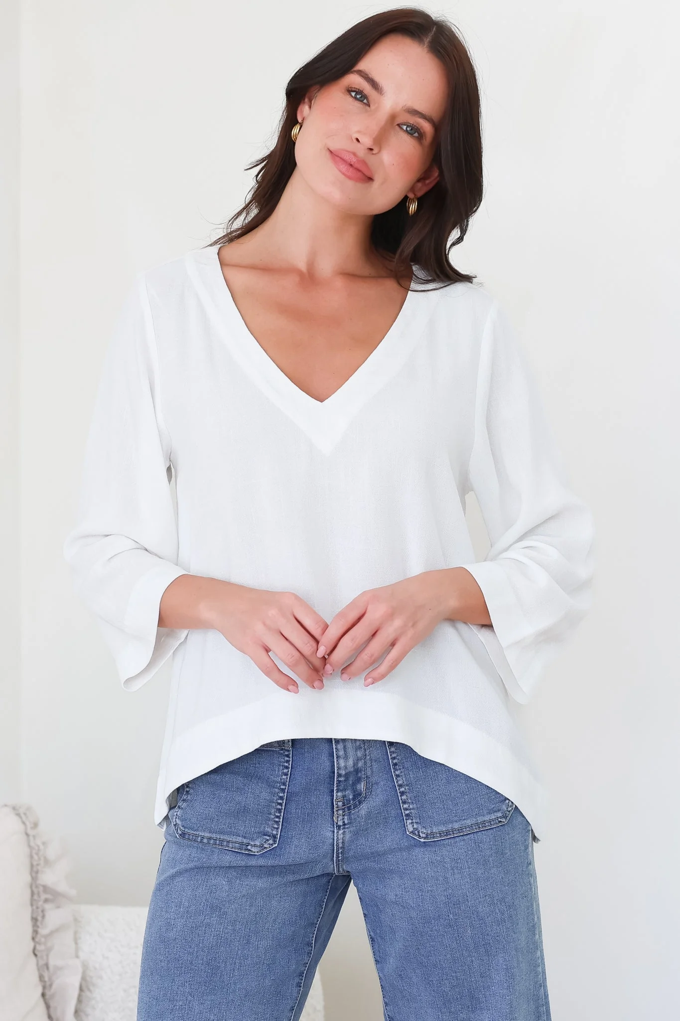 Breezer Top - Long Sleeve V Neck Pull Over Top with High Low Hemline in White - Image 3