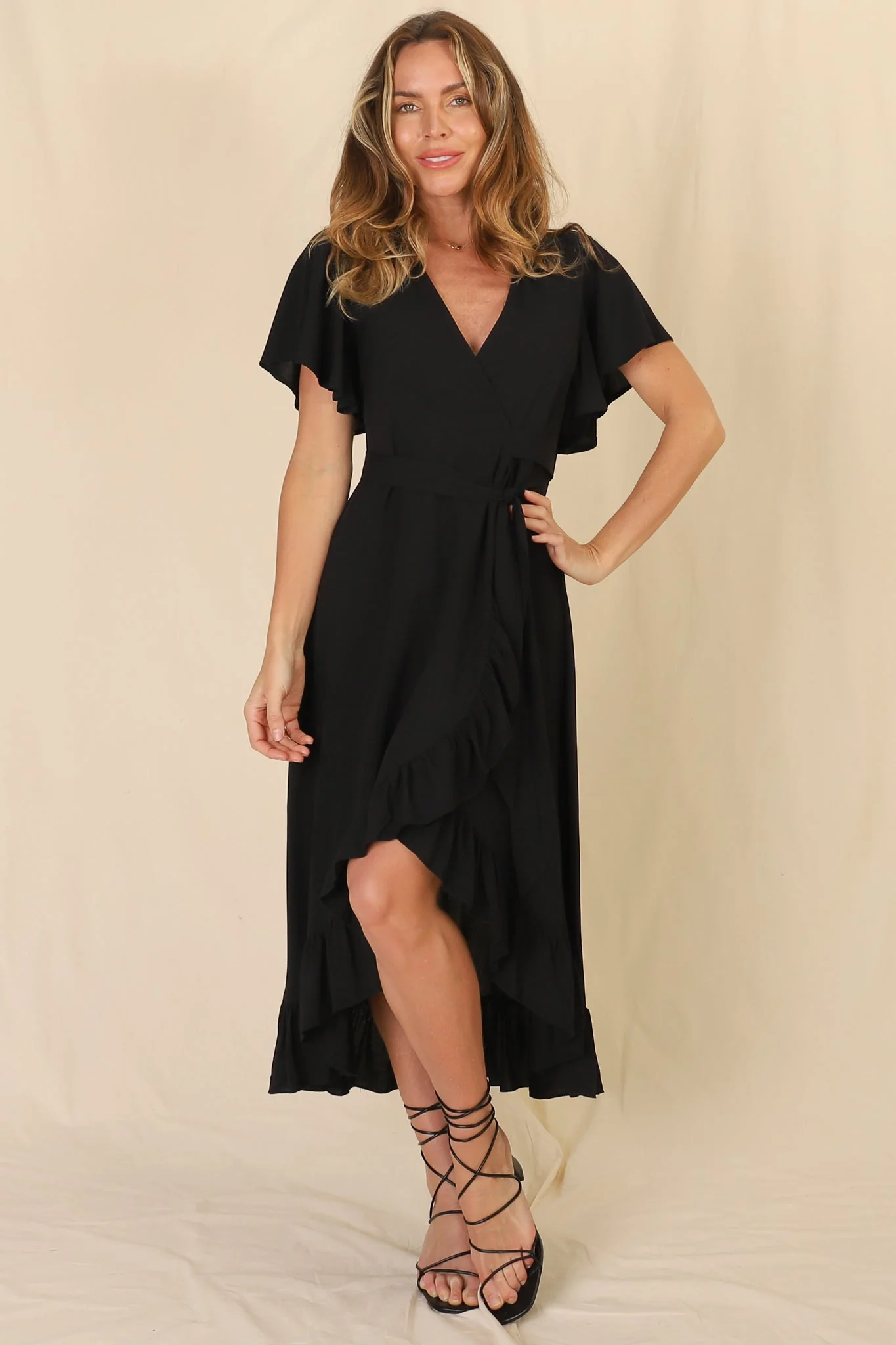 Carolina Midi Dress - V Neck Wrap Dress with Ruffle High Low Hemline in Black - Image 16