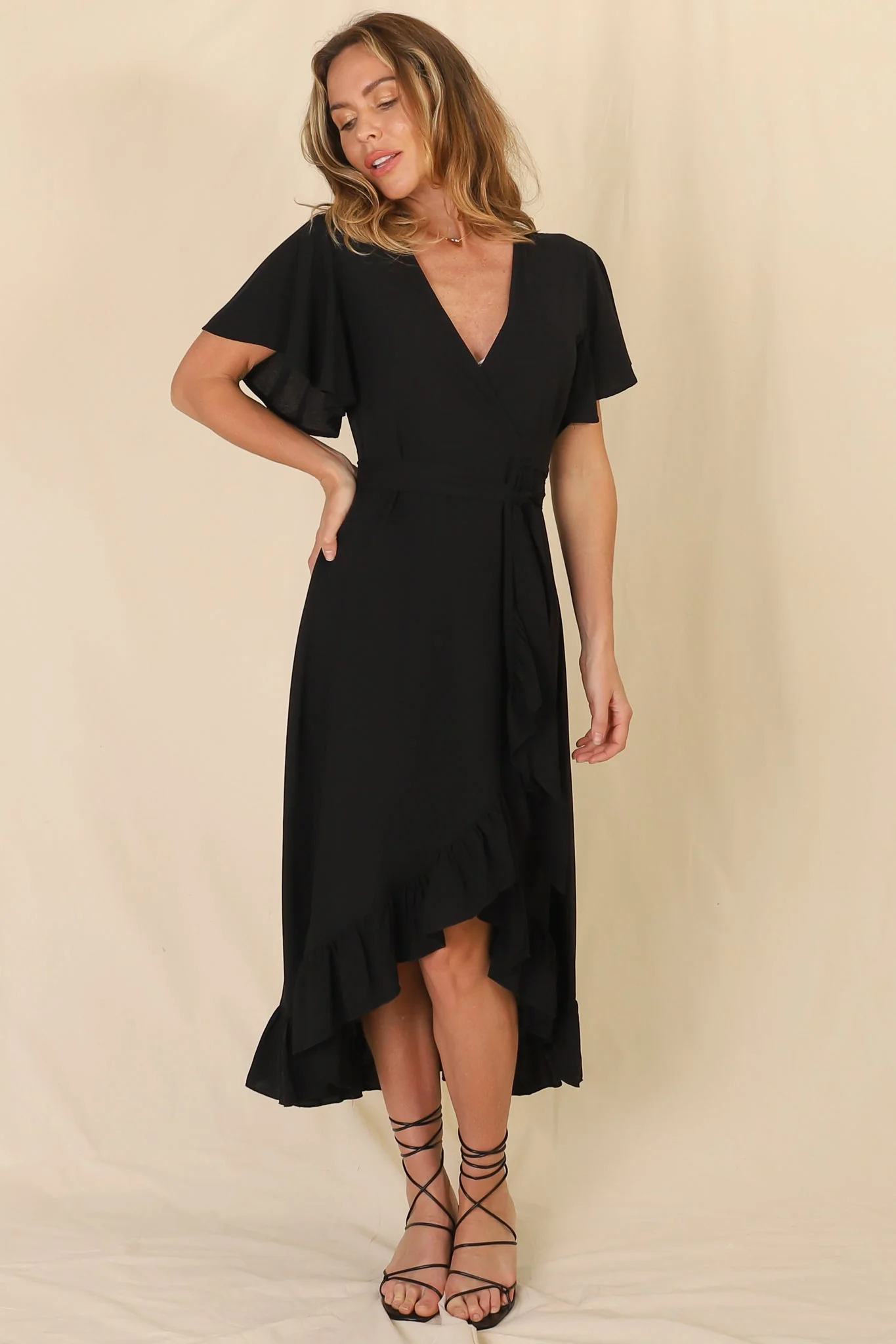 Carolina Midi Dress - V Neck Wrap Dress with Ruffle High Low Hemline in Black - Image 3