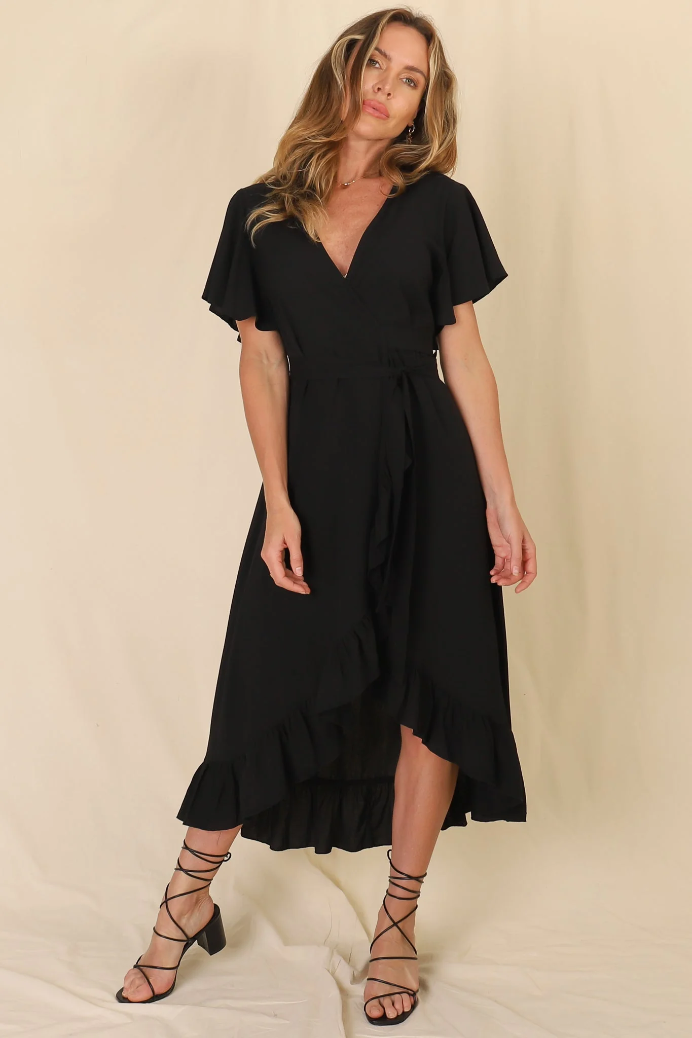 Carolina Midi Dress - V Neck Wrap Dress with Ruffle High Low Hemline in Black - Image 4
