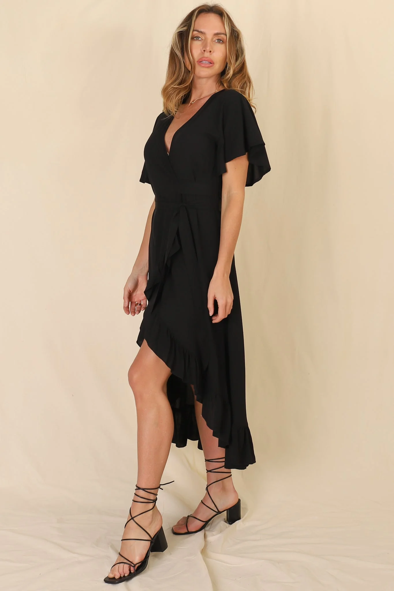 Carolina Midi Dress - V Neck Wrap Dress with Ruffle High Low Hemline in Black - Image 6