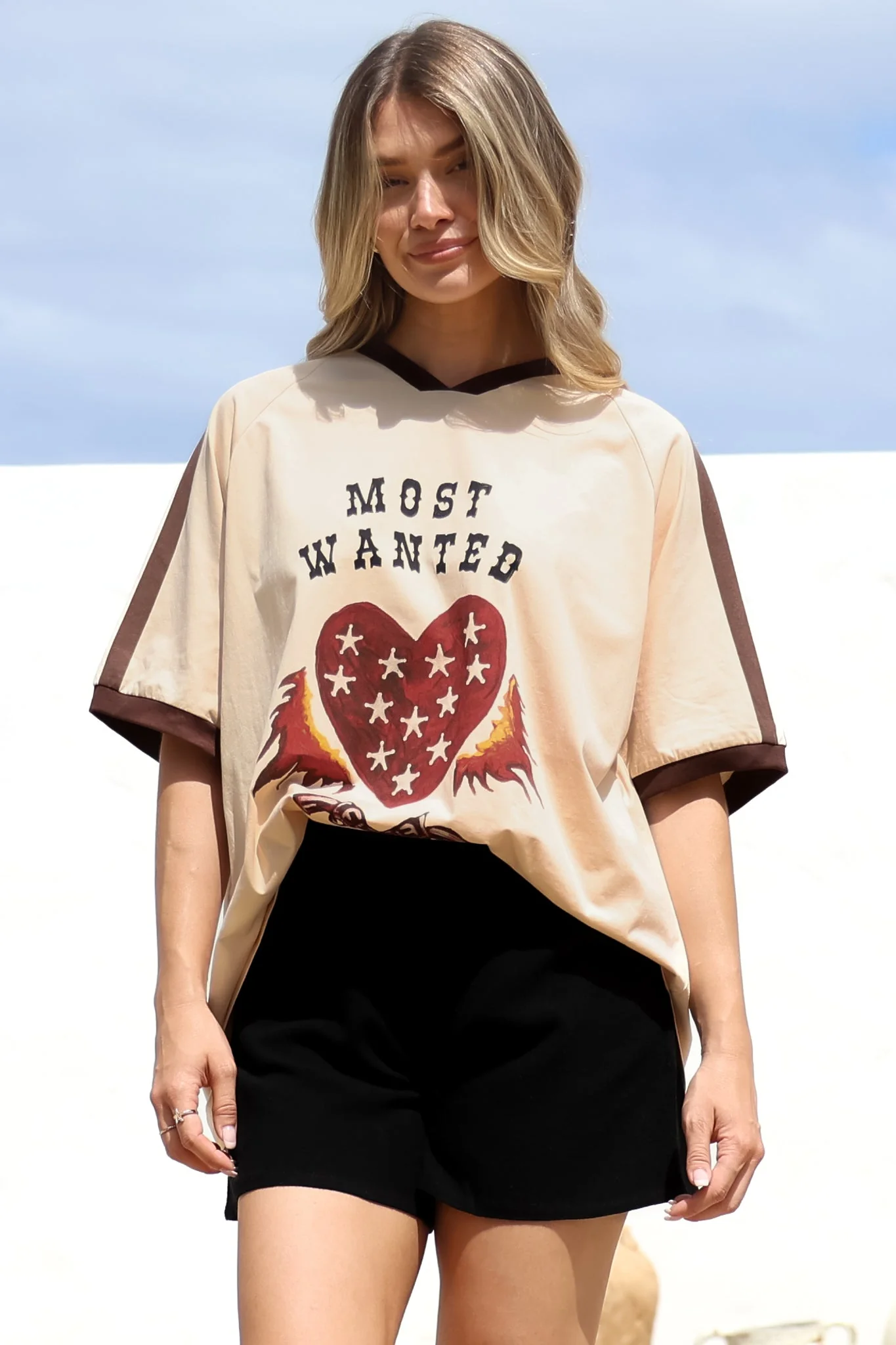 Most Wanted Tee - Graphic Print Short Sleeve T-Shirt with Racer Stripe Sleeves in Beige - Image 4