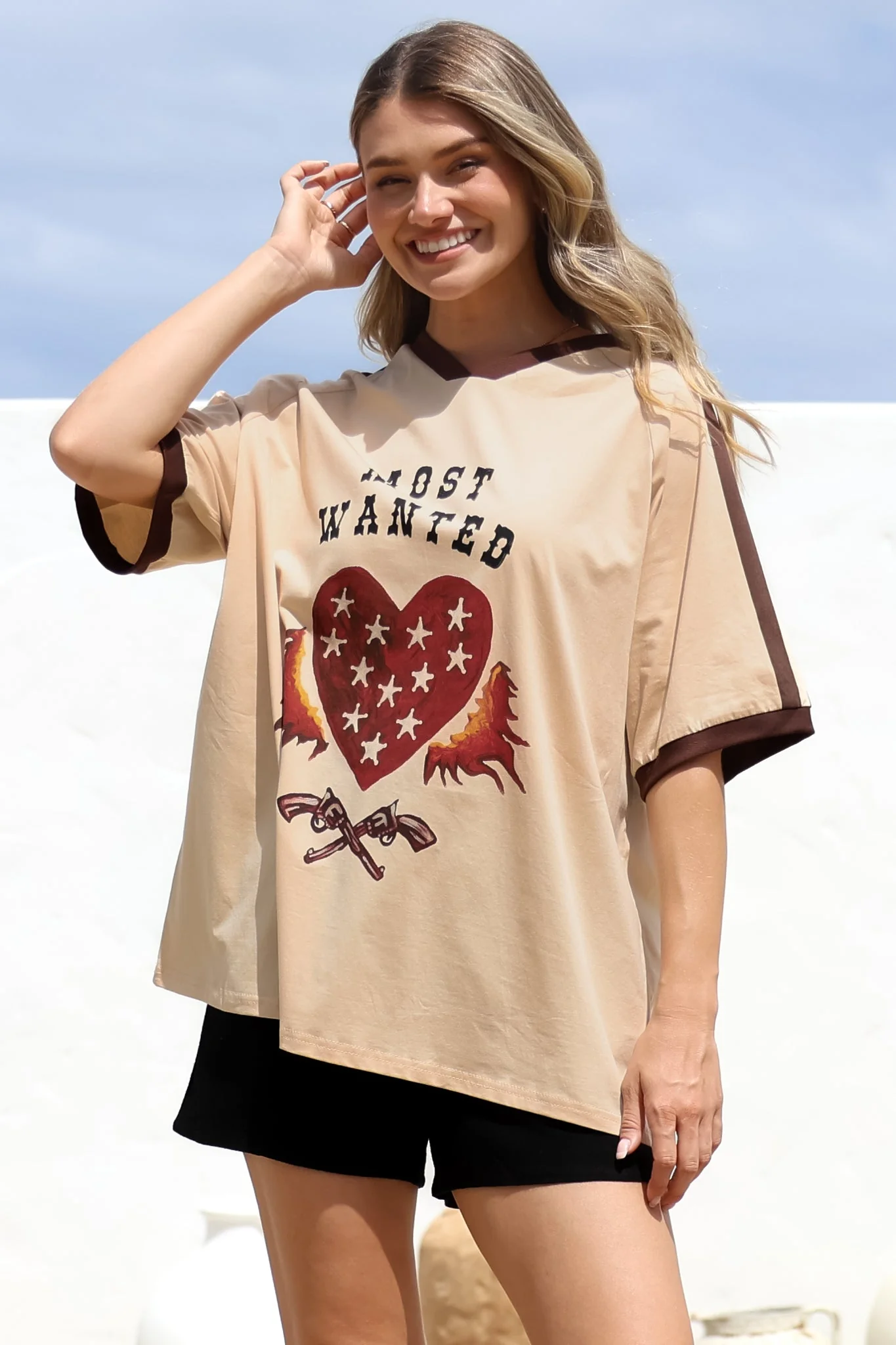 Most Wanted Tee - Graphic Print Short Sleeve T-Shirt with Racer Stripe Sleeves in Beige - Image 5