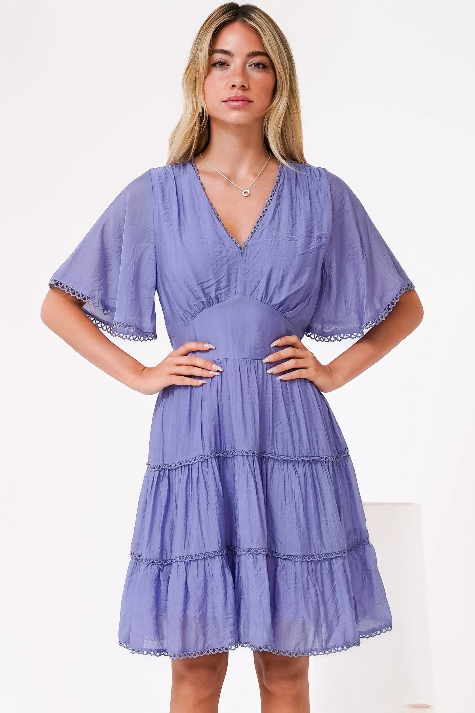 Nessie Mini Dress - Lace Trim Tiered Dress with Flutter Sleeves in Lilac - Image 5