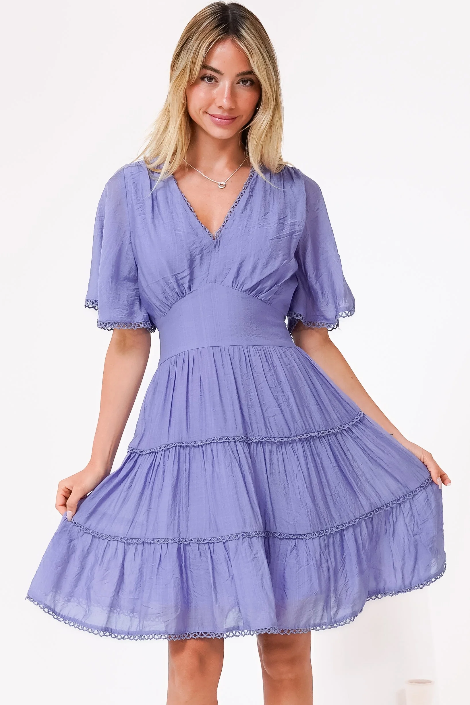 Nessie Mini Dress - Lace Trim Tiered Dress with Flutter Sleeves in Lilac - Image 6