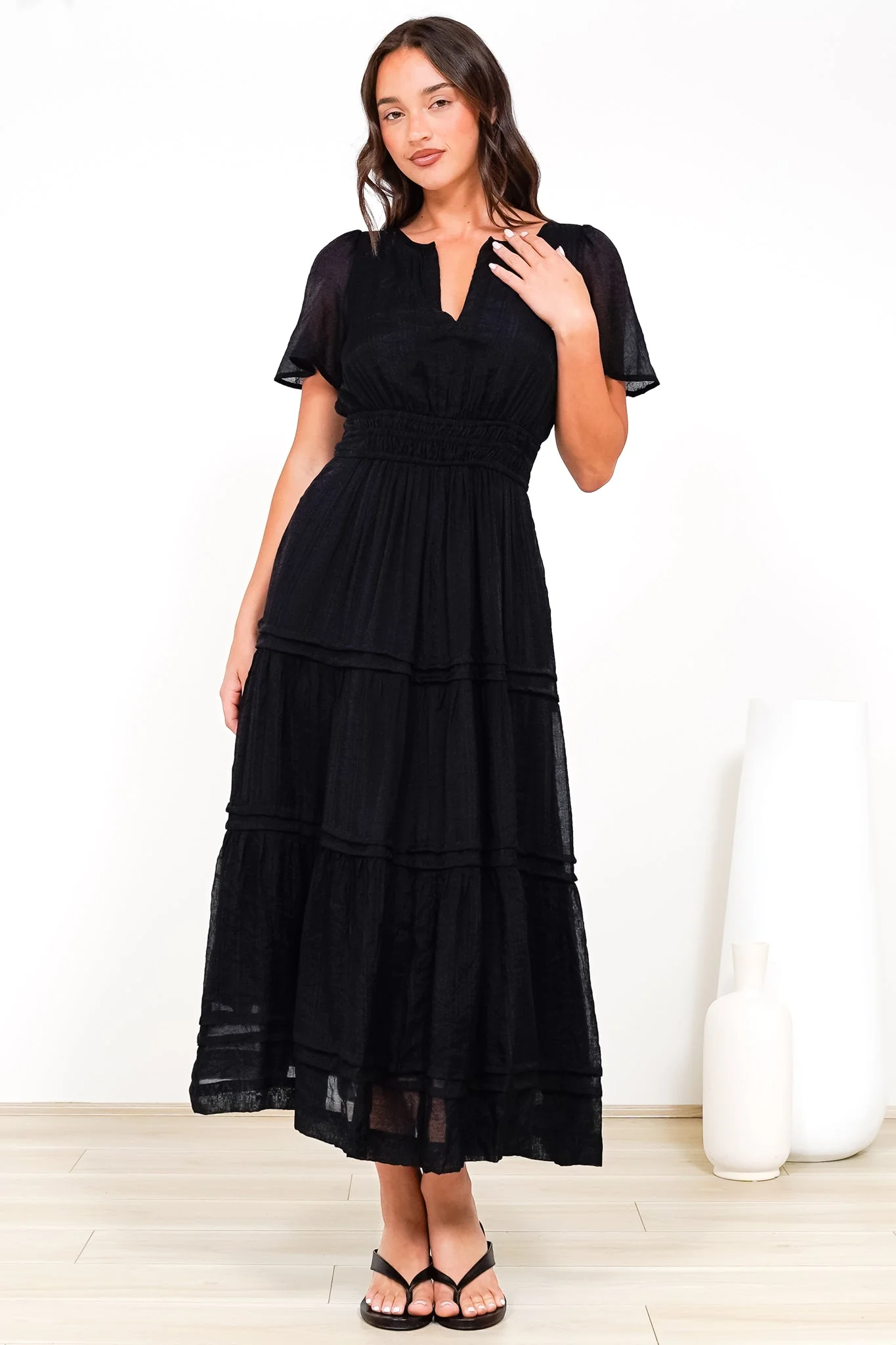 Payton Maxi Dress - Pleat Detailed A-Line Dress with Cap Flutter Sleeves in Black - Image 5