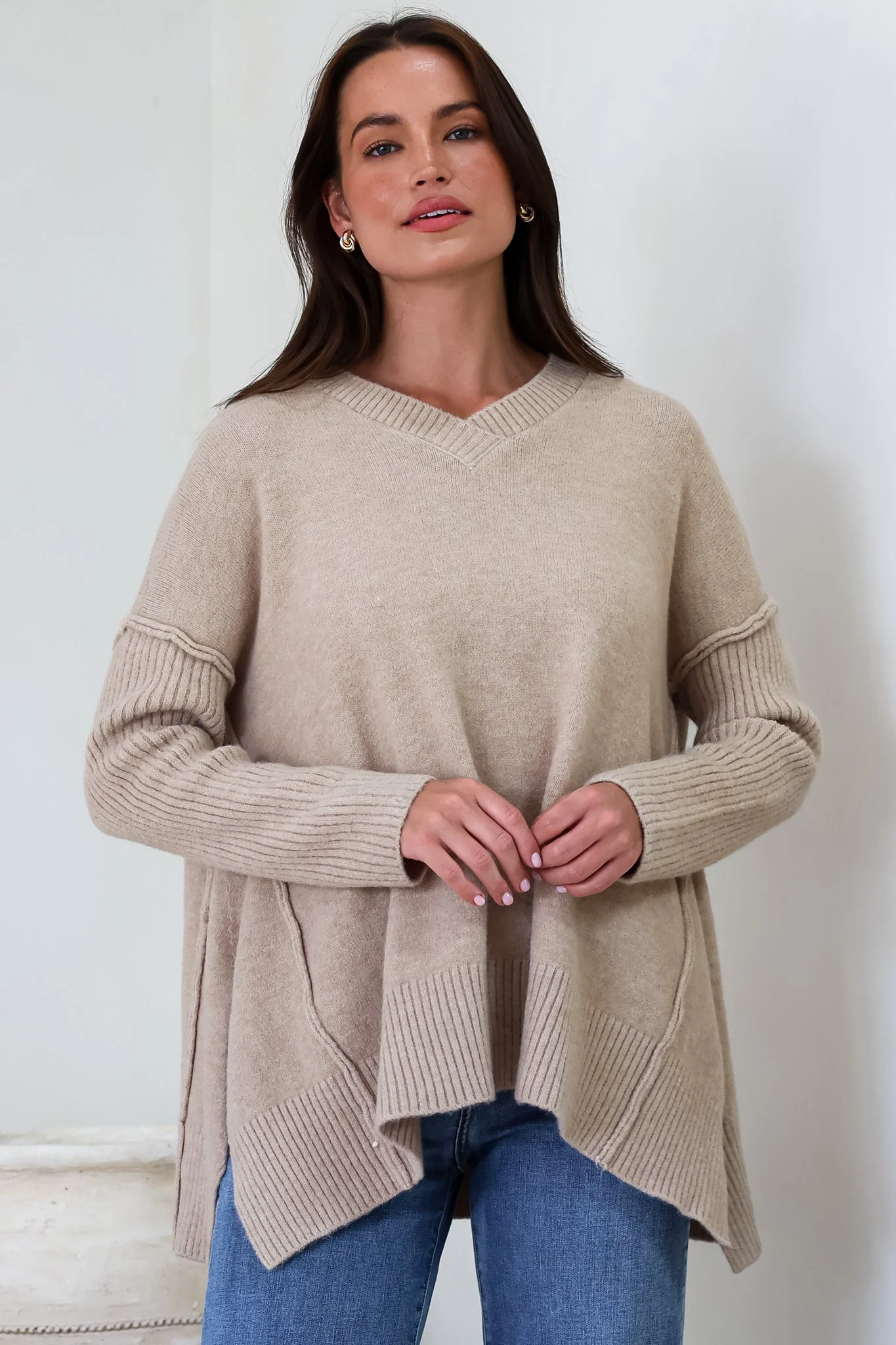 Ridge Jumper - V Neck Relaxed Shark Bite Ribbed Hemline Knit in Beige - Image 7