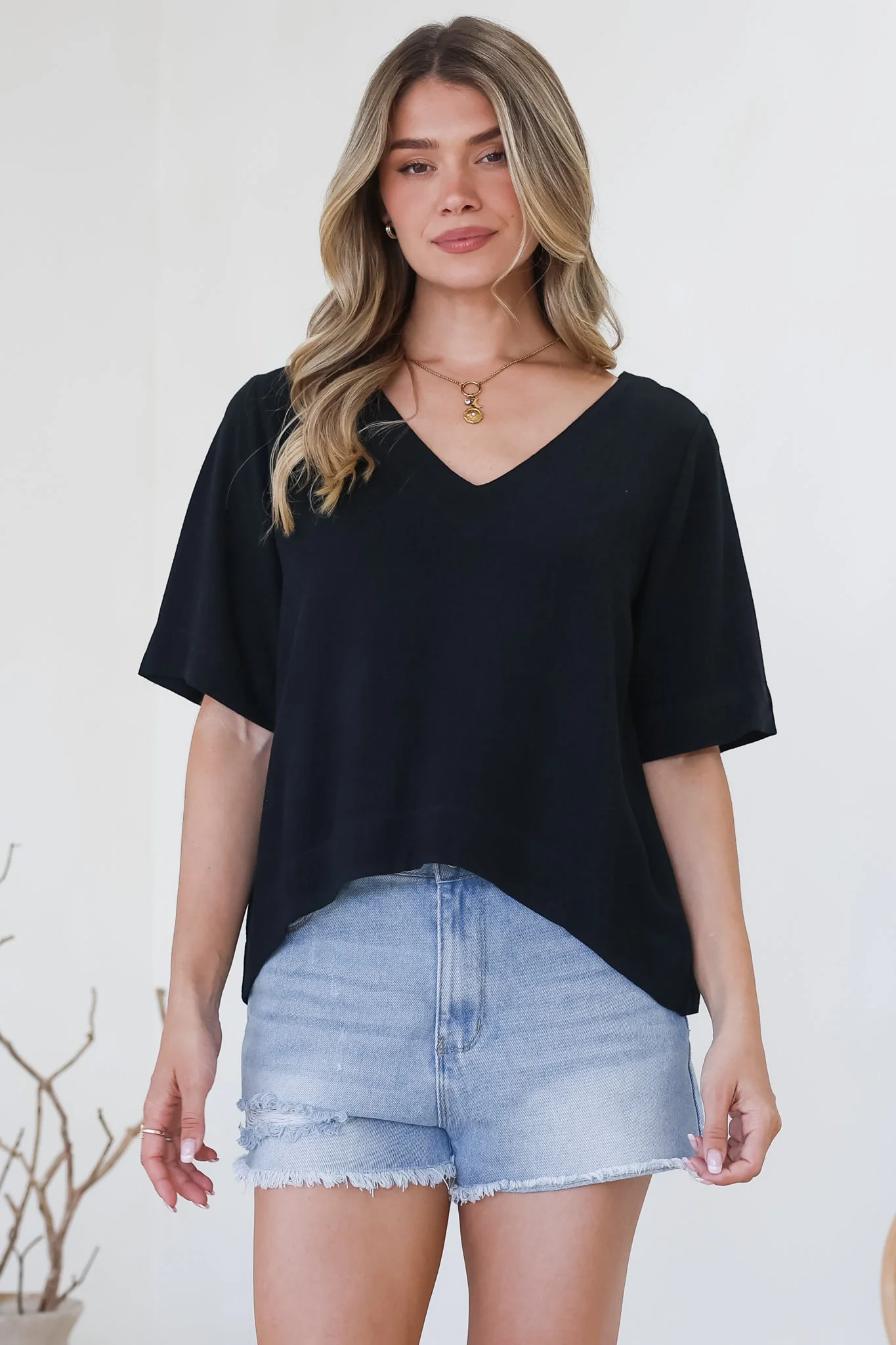 Shandy Top - V-Neck Boxy High Low Top with Short Sleeves in Black - Image 2