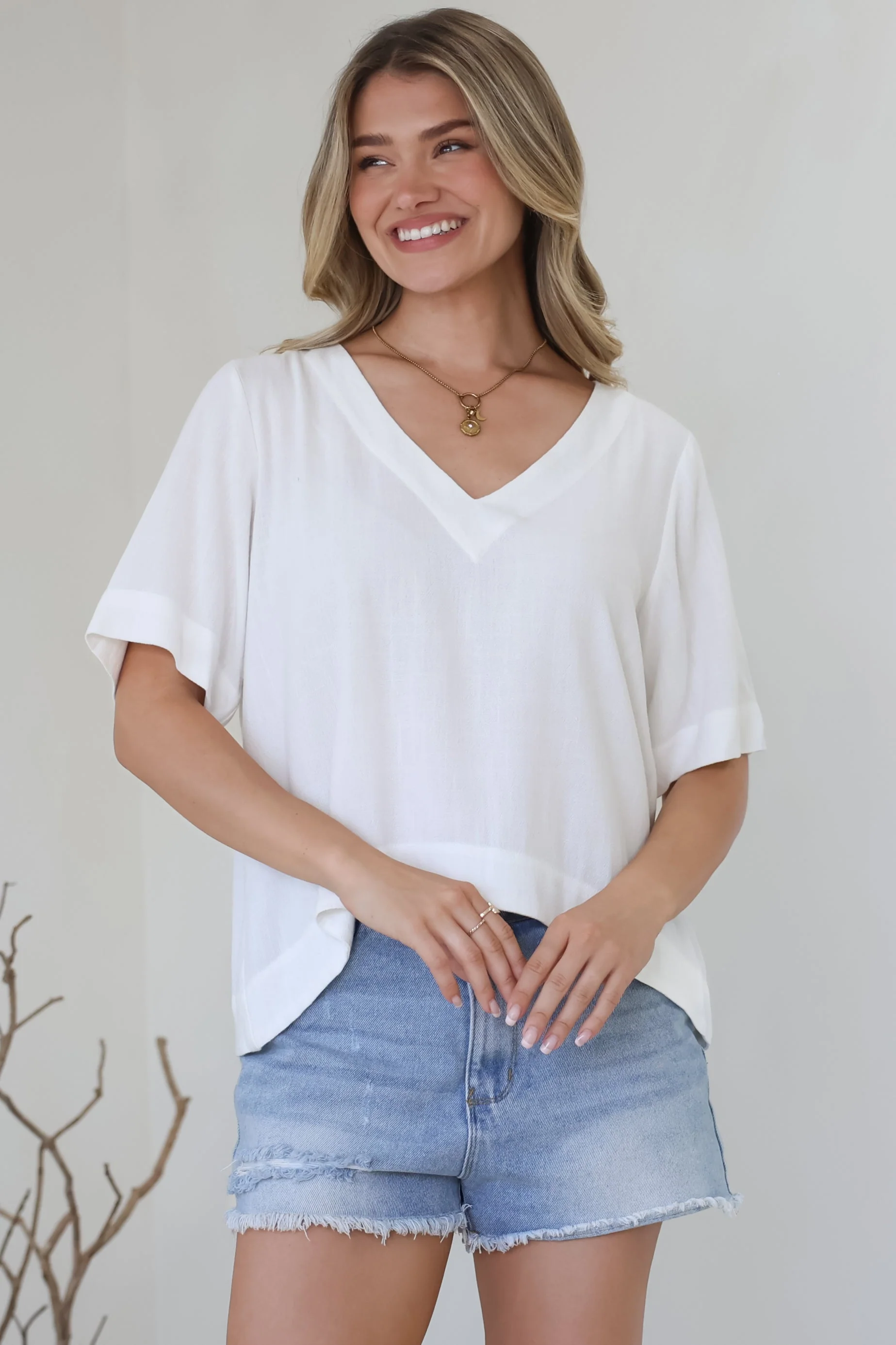 Shandy Top - V-Neck Boxy High Low Top with Short Sleeves in White - Image 4