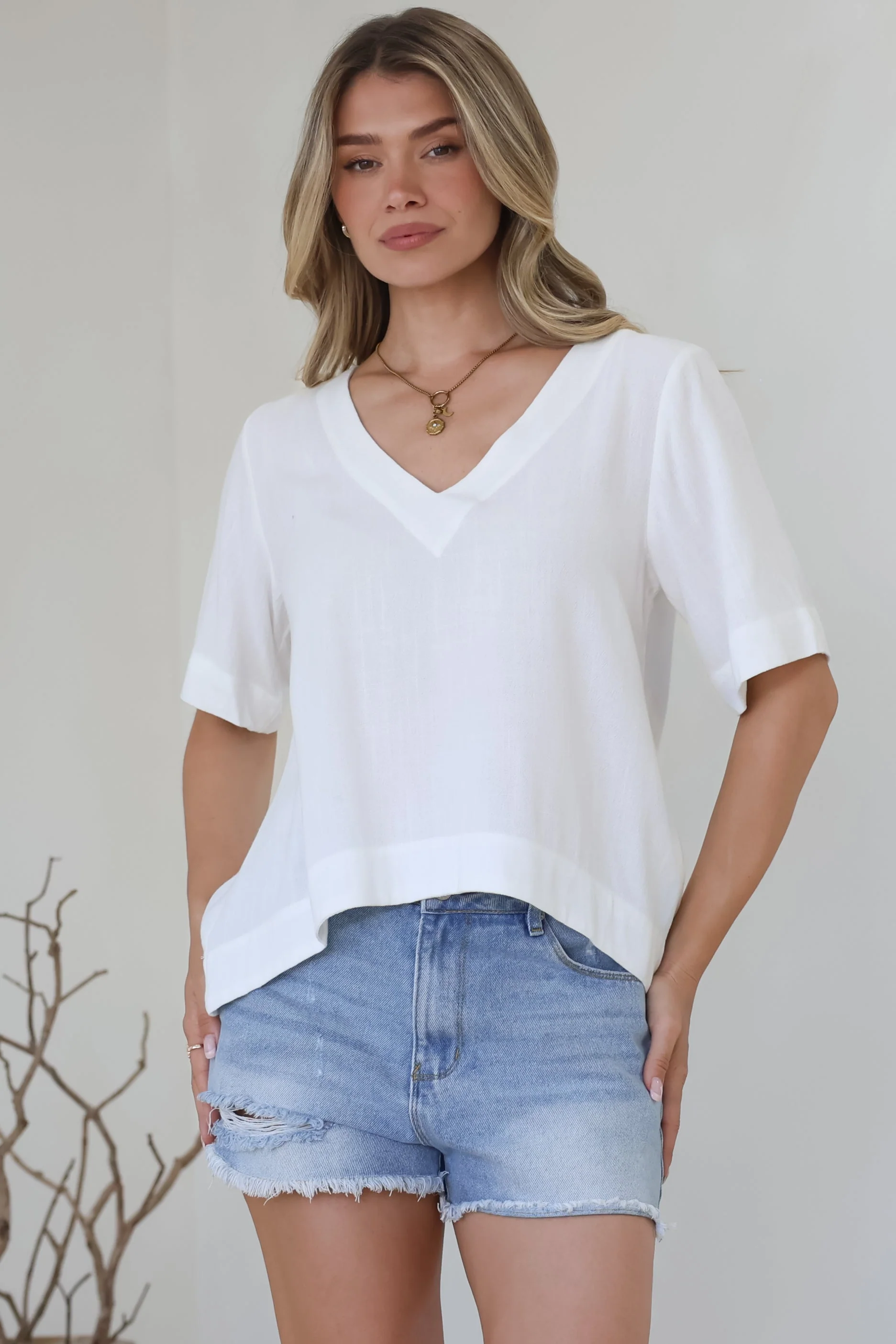 Shandy Top - V-Neck Boxy High Low Top with Short Sleeves in White - Image 6
