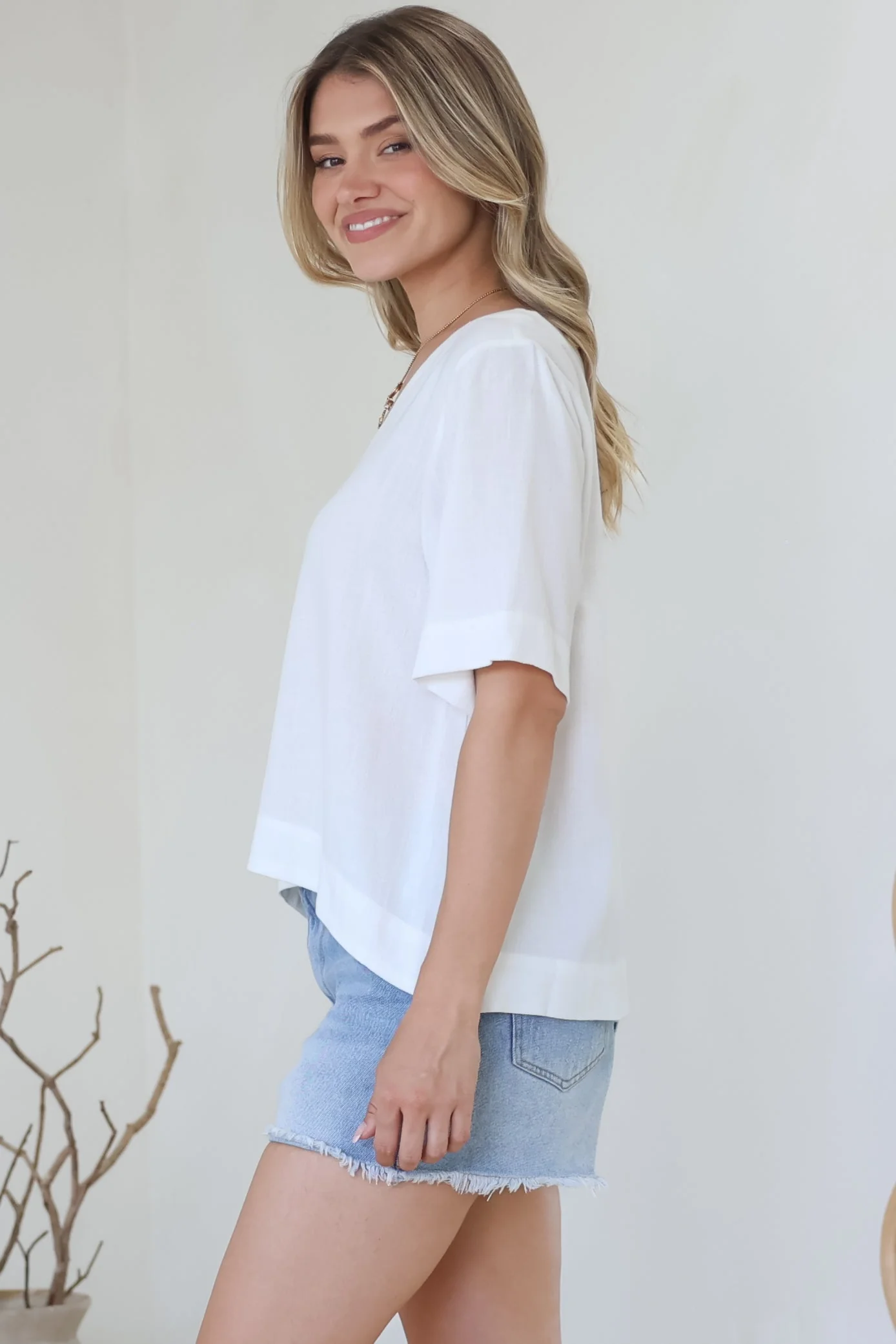 Shandy Top - V-Neck Boxy High Low Top with Short Sleeves in White - Image 7