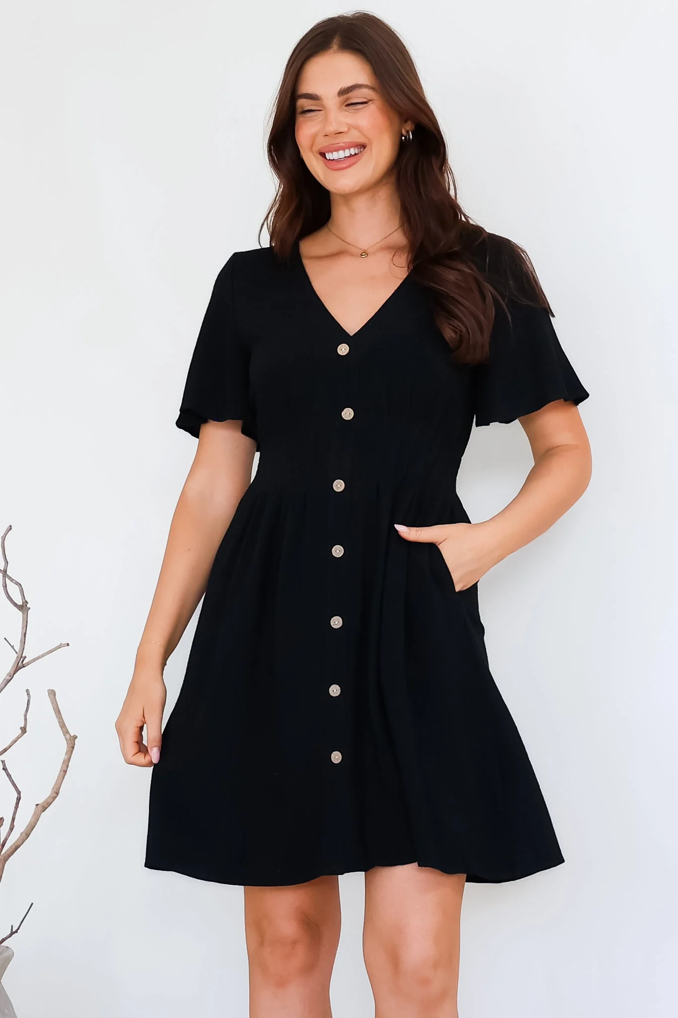Stellar Mini Dress - Flutter Sleeve A-Line Dress with Pin Tuck Waist Detail in Black - Image 5